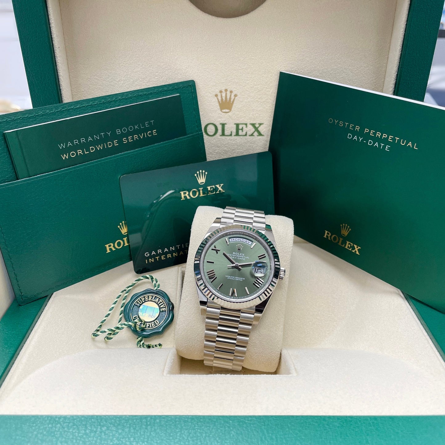 Rolex Day-Date 40 White Gold Olive Green Roman Dial Fluted