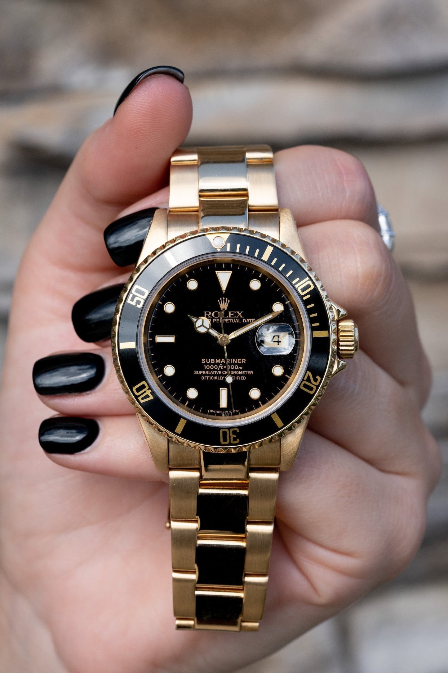 Rolex gold and black