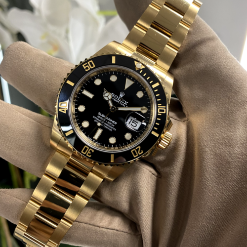 Rolex gold and black